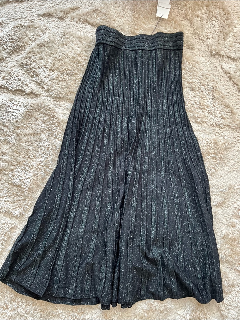 Sandro Paris long pleated knit skirt featuring a shimmering metallic or lurex fi